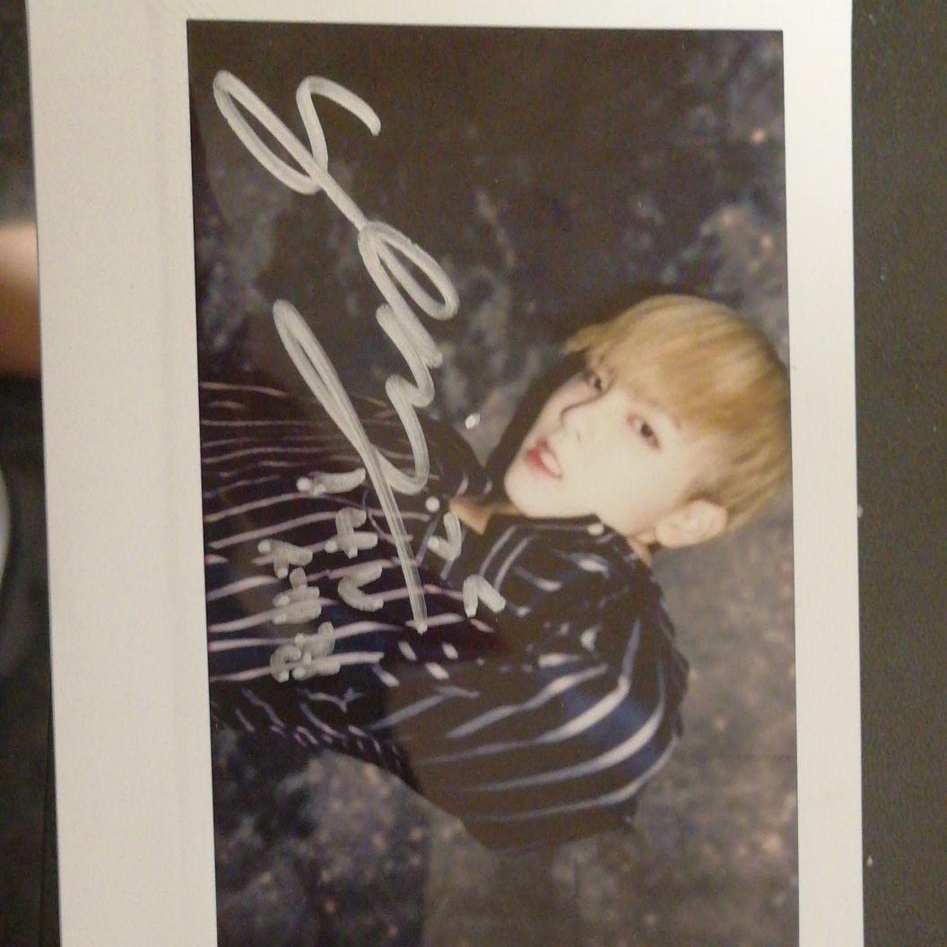 Signed polaroid